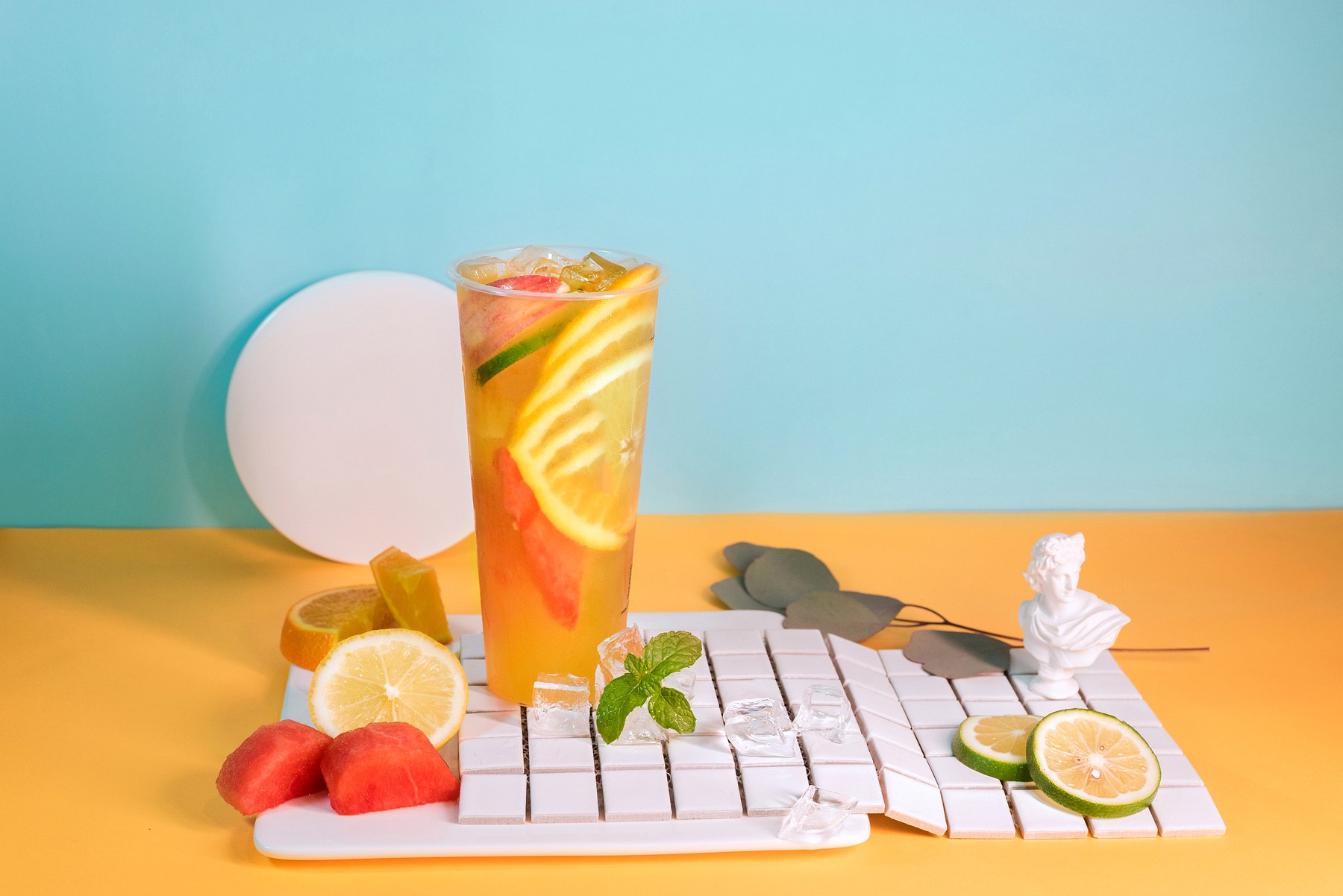 Signature fruit tea with citrus, watermelon and ice